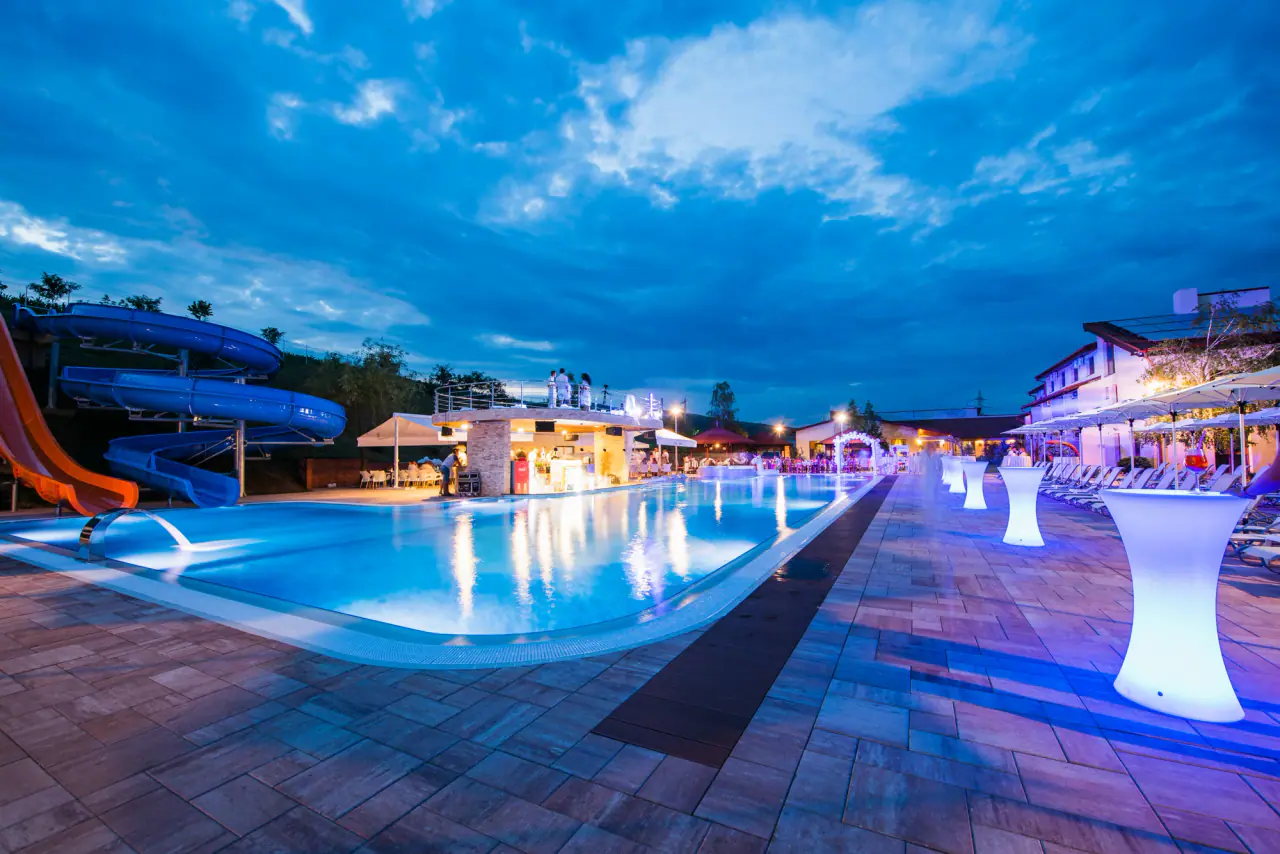 Astoria Pool Park illuminated at dusk